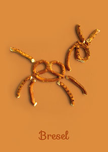 Bresel; Wortwitz -ein Esel aus kleinen Salzbrezeln auf orangem Grund